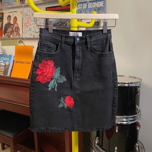 Vibrant Mini Denim Black Skirt with Rose Appliqués (Size M)